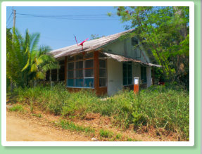 One of the first houses on the top of the road coming from the hangar. I do not remember what it was used for.